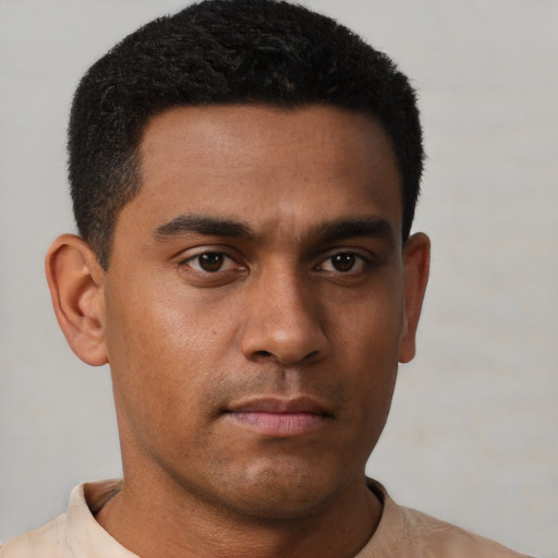 Neutral black young-adult male with short  black hair and brown eyes