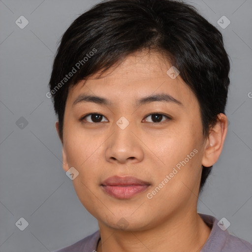 Joyful asian young-adult female with short  black hair and brown eyes