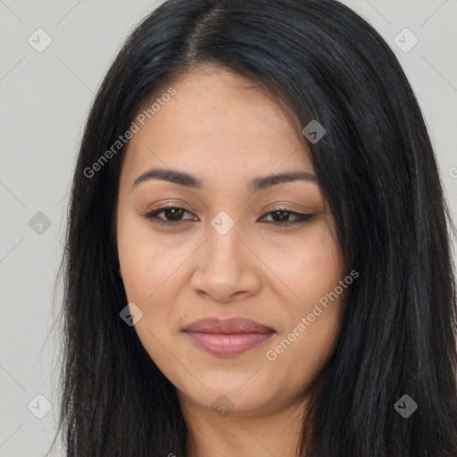 Joyful latino young-adult female with long  black hair and brown eyes