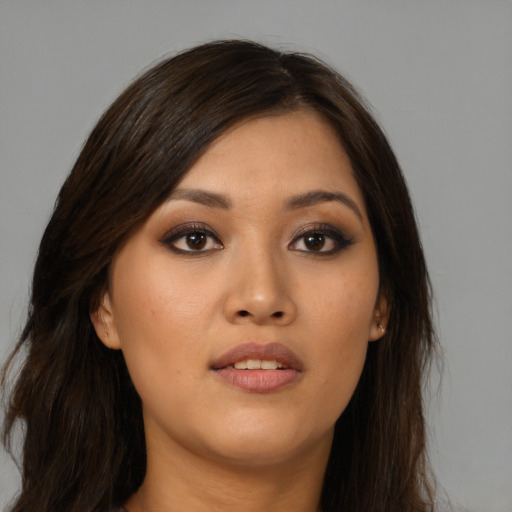 Neutral asian young-adult female with long  brown hair and brown eyes