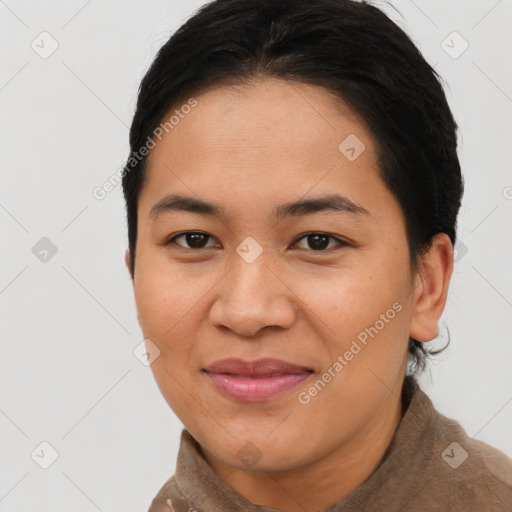 Joyful asian young-adult female with short  brown hair and brown eyes