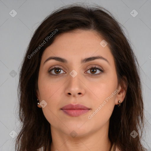 Joyful white young-adult female with long  brown hair and brown eyes