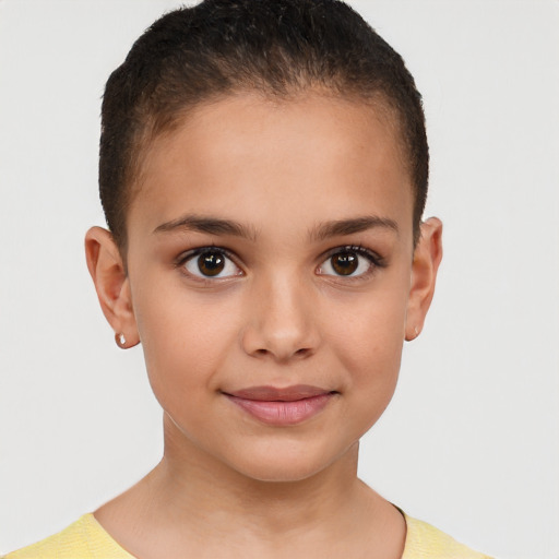 Joyful white child female with short  brown hair and brown eyes