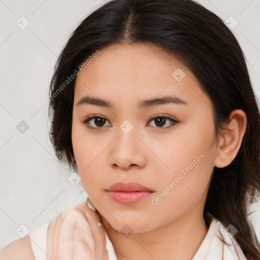 Neutral white young-adult female with medium  brown hair and brown eyes