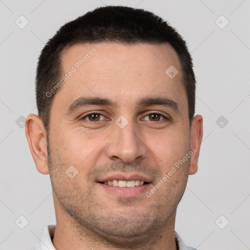 Joyful white young-adult male with short  brown hair and brown eyes