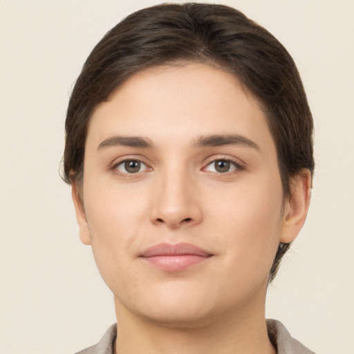 Neutral white young-adult female with short  brown hair and brown eyes