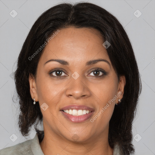 Joyful black young-adult female with medium  brown hair and brown eyes