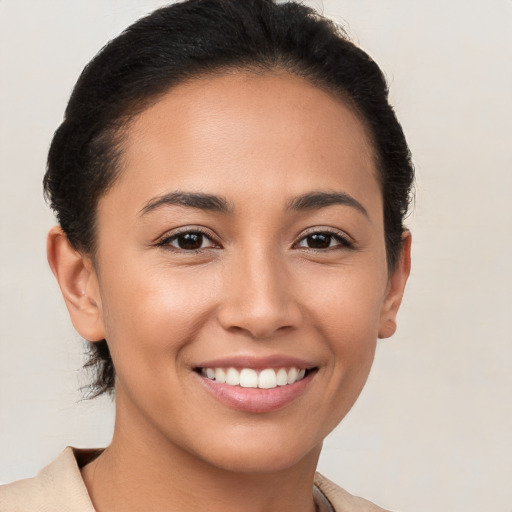 Joyful white young-adult female with short  brown hair and brown eyes