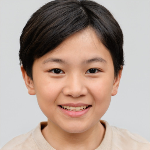 Joyful asian child female with short  brown hair and brown eyes
