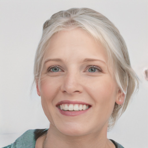 Joyful white young-adult female with medium  blond hair and blue eyes