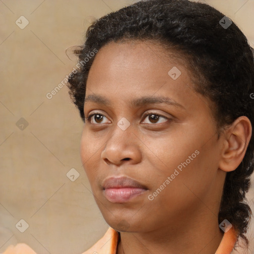 Neutral black young-adult female with short  brown hair and brown eyes