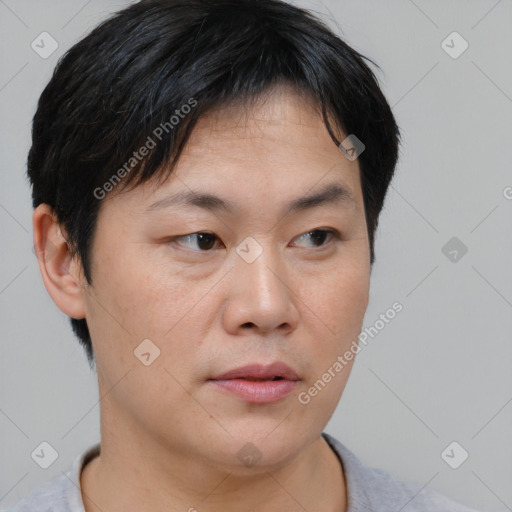 Neutral asian young-adult female with short  black hair and brown eyes