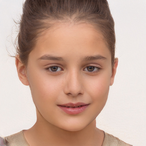 Joyful white child female with short  brown hair and brown eyes