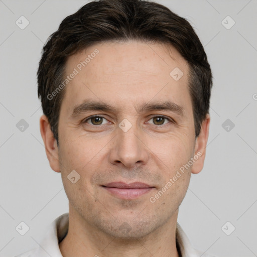 Joyful white adult male with short  brown hair and grey eyes