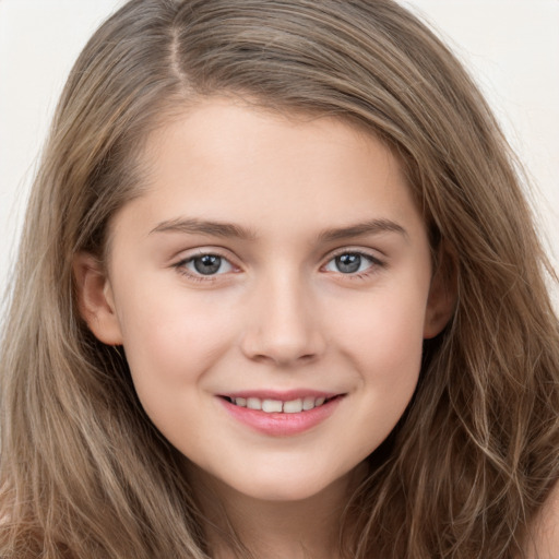 Joyful white child female with long  brown hair and grey eyes