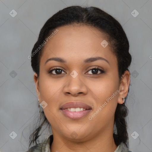Joyful latino young-adult female with long  brown hair and brown eyes