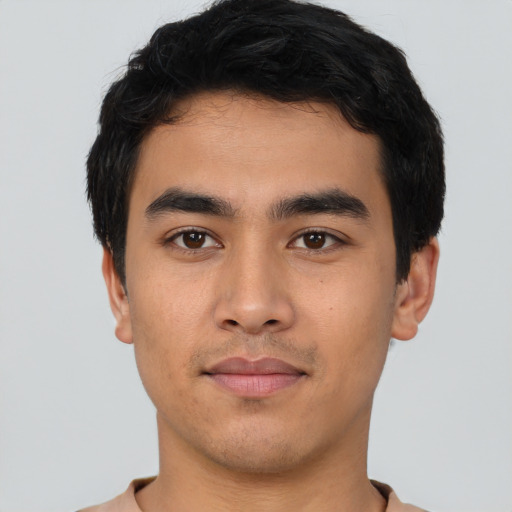 Neutral latino young-adult male with short  black hair and brown eyes