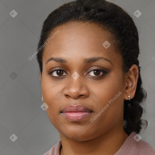 Joyful black young-adult female with medium  brown hair and brown eyes