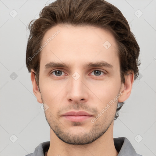 Neutral white young-adult male with short  brown hair and grey eyes