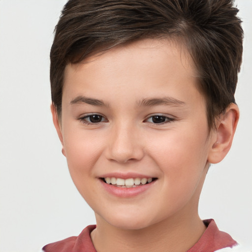 Joyful white child female with short  brown hair and brown eyes