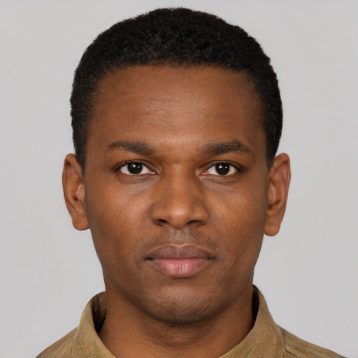 Neutral black young-adult male with short  brown hair and brown eyes