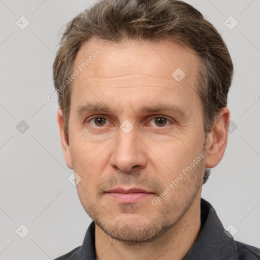 Neutral white adult male with short  brown hair and brown eyes