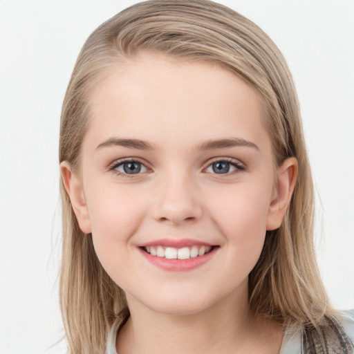 Joyful white child female with long  brown hair and grey eyes