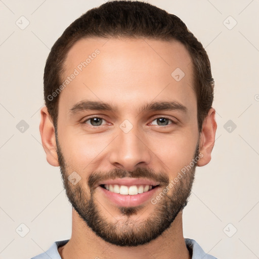 Joyful white young-adult male with short  brown hair and brown eyes