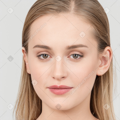 Joyful white young-adult female with long  brown hair and blue eyes