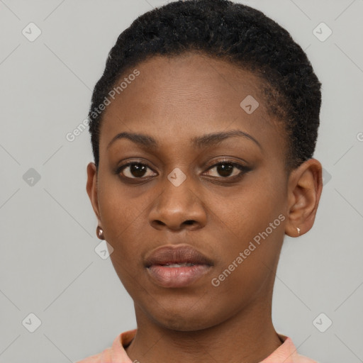 Neutral black young-adult female with short  brown hair and brown eyes