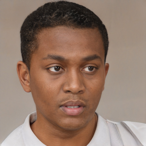 Neutral black young-adult male with short  brown hair and brown eyes
