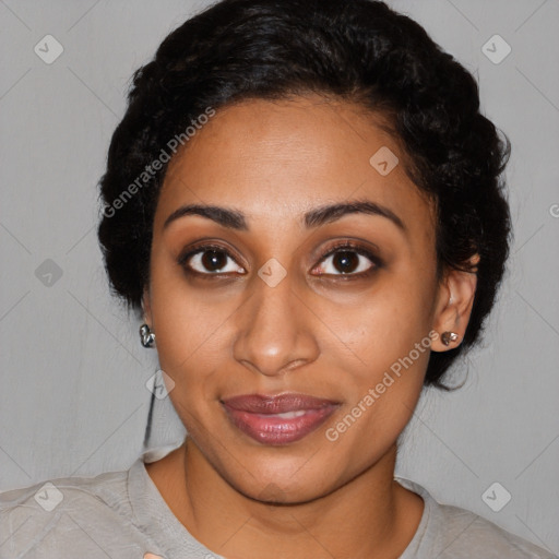 Joyful latino young-adult female with short  brown hair and brown eyes