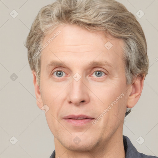 Joyful white adult male with short  brown hair and grey eyes