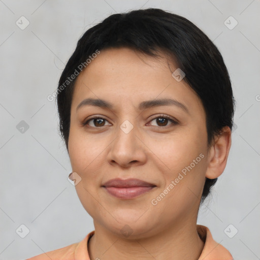 Joyful latino young-adult female with short  brown hair and brown eyes