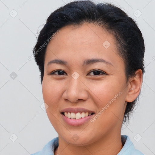 Joyful asian young-adult female with short  brown hair and brown eyes