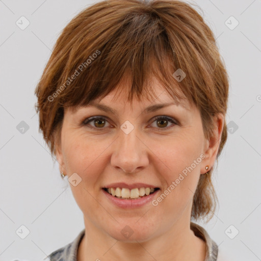 Joyful white adult female with medium  brown hair and brown eyes