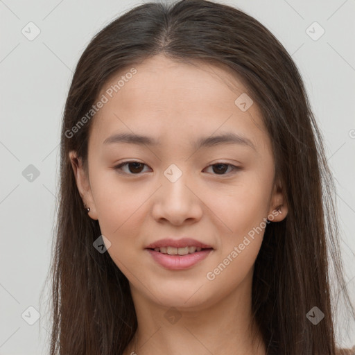 Joyful asian young-adult female with long  brown hair and brown eyes