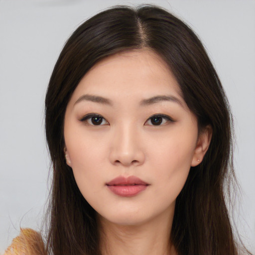 Neutral asian young-adult female with long  brown hair and brown eyes