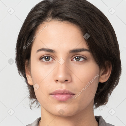 Neutral white young-adult female with medium  brown hair and brown eyes