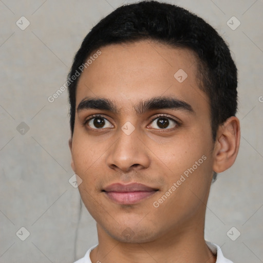 Joyful latino young-adult male with short  black hair and brown eyes