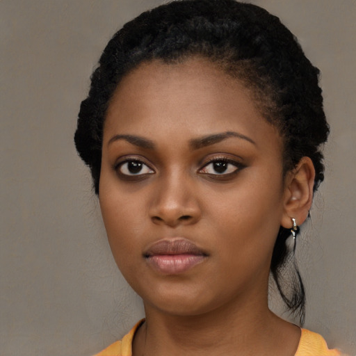 Neutral black young-adult female with long  black hair and brown eyes