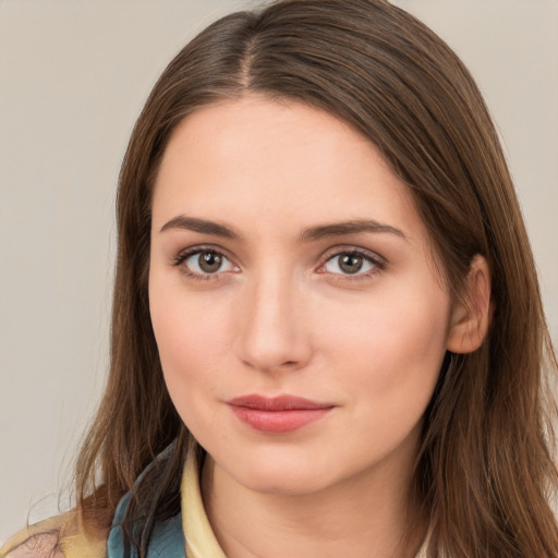 Neutral white young-adult female with long  brown hair and brown eyes