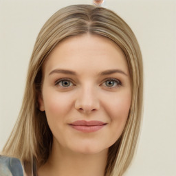 Joyful white young-adult female with long  brown hair and green eyes