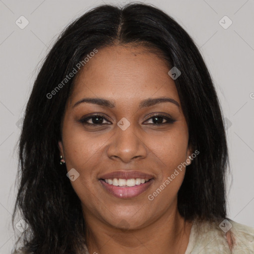 Joyful black young-adult female with long  brown hair and brown eyes