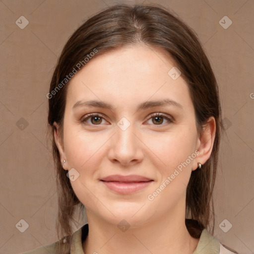 Joyful white young-adult female with medium  brown hair and brown eyes