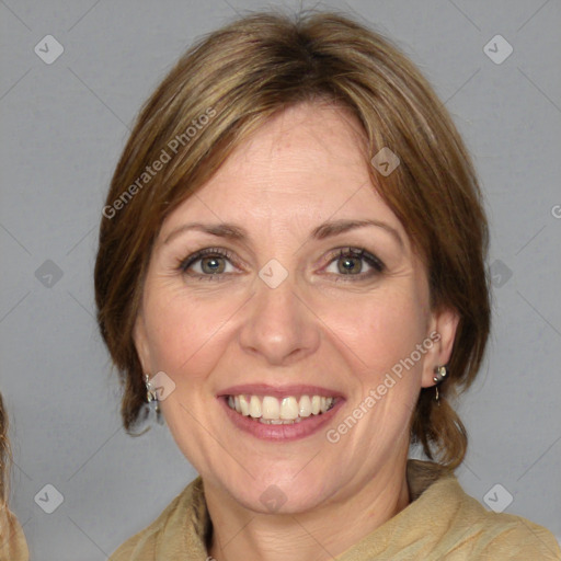 Joyful white adult female with medium  brown hair and blue eyes