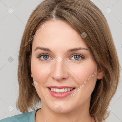 Joyful white young-adult female with medium  brown hair and green eyes