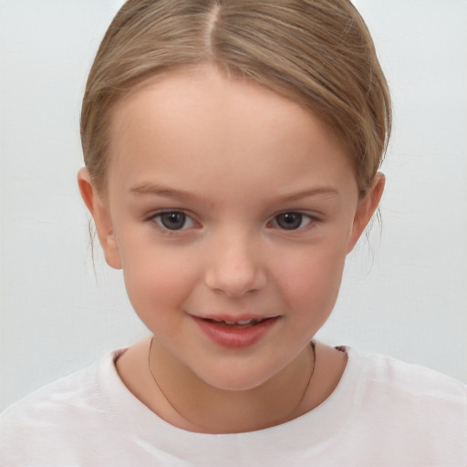 Joyful white child female with short  brown hair and brown eyes