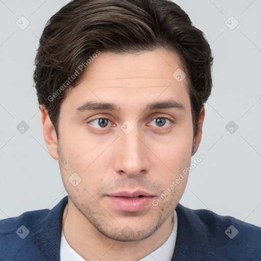 Neutral white young-adult male with short  brown hair and brown eyes