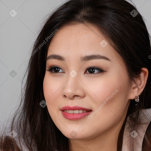 Joyful asian young-adult female with long  brown hair and brown eyes